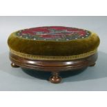 A Victorian walnut circular footstool,