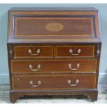 An Edwardian inlaid mahogany bureau, fall flap with Art Nouveau oval,