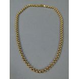 A neckchain in 9ct gold belcher links, approximate length 45cm,