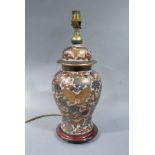 A reproduction Japanese satsuma baluster table lamp and cover decorated with chrysanthemum blooms
