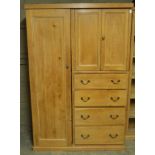 A Victorian pine combination wardrobe, the plain cornice above one long cupboard, pair of cupboards,