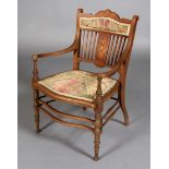 An Edward VII inlaid mahogany elbow chair,