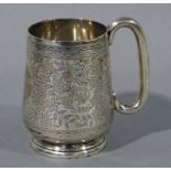An Edward VII foliate engraved christening mug with vacant cartouche and plain loop handle,