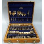 A Lin Yu Brothers brass canteen of table cutlery, wooden case,