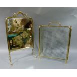 A late Victorian brass framed bevelled mirror plate fire screen painted with white roses,