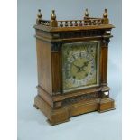 A Victorian oak cased mantel clock,