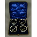 A set of four Edward VII silver open salts each with everted crimped rim,