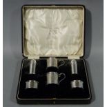 A six piece cruet set, cylindrical form, comprising pair of pepperettes,