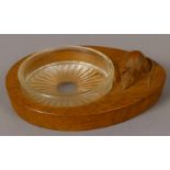 Ben Oxley of Windsor, an oak and glass lined butter dish of tear-shape,