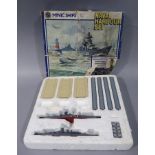 A Minic ships naval harbour set, The Bismark and Scharnorst, boxed,