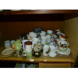 A large quantity of decorative ceramics including coffee service tea ware, mugs, plates,