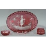 A Victorian cranberry glass oval dressing table tray decorated in Mary Gregory style with a female