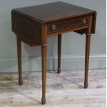 An Edwardian inlaid mahogany drop flap single drawer occasional table on square tapered legs with