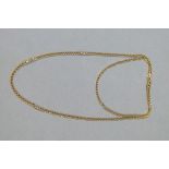 A neckchain in 9ct gold faceted curb links, approximate length 66cm,