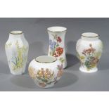 Four Wedgwood vases baluster, squat baluster, panelled and waisted,