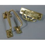 A pair of brass door handles;