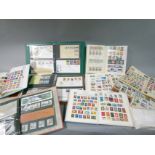 Collection of world stamps in albums together with GB EIIR,