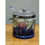 A Moorcroft wisteria pattern cylindrical jam dish with silver plated mounts, pressed marks,