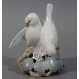 A Royal Copenhagen porcelain model of two doves, 14cm high, underglaze mark in blue,