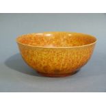 A Royal Lancastrian bowl of orange mottled glaze 19cm diameter x 8cm high