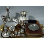 A pair of Victorian copper table candlesticks, a pair of silver plated goblets,