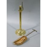 A Victorian brass candlestand on circular base,