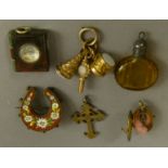 A micromosiac horseshoe shaped brooch, a white metal crucifix,