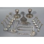 A pair of silver dwarf candlesticks, a silver dressing table box and cover,