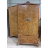 Two similar walnut veneered wardrobes,