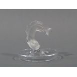 Lalique - a circular dressing table dish moulded with frosted leaping fish, 9cm high, engraved mark,
