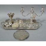 A silver plate two handled gallery tray, a silver plated two branch candelabrum,