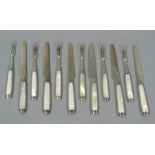 A set of six mother-of-pearl handled silver fruit knives and forks, Victorian,