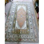 A Caucasian style woollen rug,