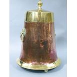 An Edwardian copper and brass coal scuttle the cylindrical lid with urnular finial,