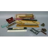 A quantity of drawing implements, rules, spectacles,