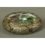 A Russian silver and enamel oval box, the hinged lid cast as George slaying the dragon,