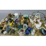 A quantity of decorative items including floral encrusted, Artone miniature teapot, paperweights,