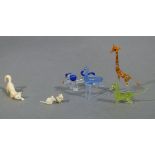 A miniature ivory cat and two mice, cat 3cm long; a glass giraffe, two glass dogs and a blue glass