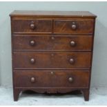 A Victorian mahogany chest of two short and three long drawers with turned handles and on splayed