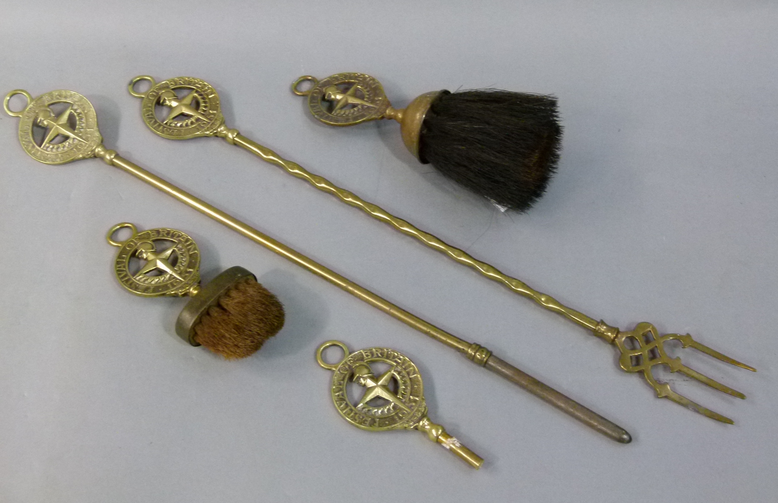 Festival of Britain 1951 - a brass toasting fork, a poker, two brushes and a spare handle