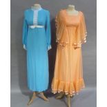 Two full length bridesmaid dresses, one in turquoise chiffon with lace collar and bodice detail