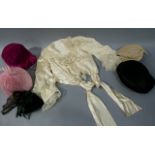 A cream satin and lace blouse with full flared sleeve, together with five various hats