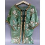 A Chinese green silk and embroidered jacket