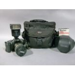 A Canon EOS 5000 35mm camera with Tamron AF 90mm F/2.8 Macro 55 272E lens, Lowepro camera bag,