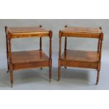 A pair of reproduction yew wood side/lamp tables undertier and drawer on slender turned uprights