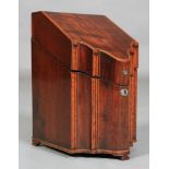 A George III mahogany and pear-wood banded knife box with fitted interior, the serpentine front with