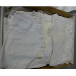 A quantity of infants and young girls clothes including, white cotton embroidered dresses, white