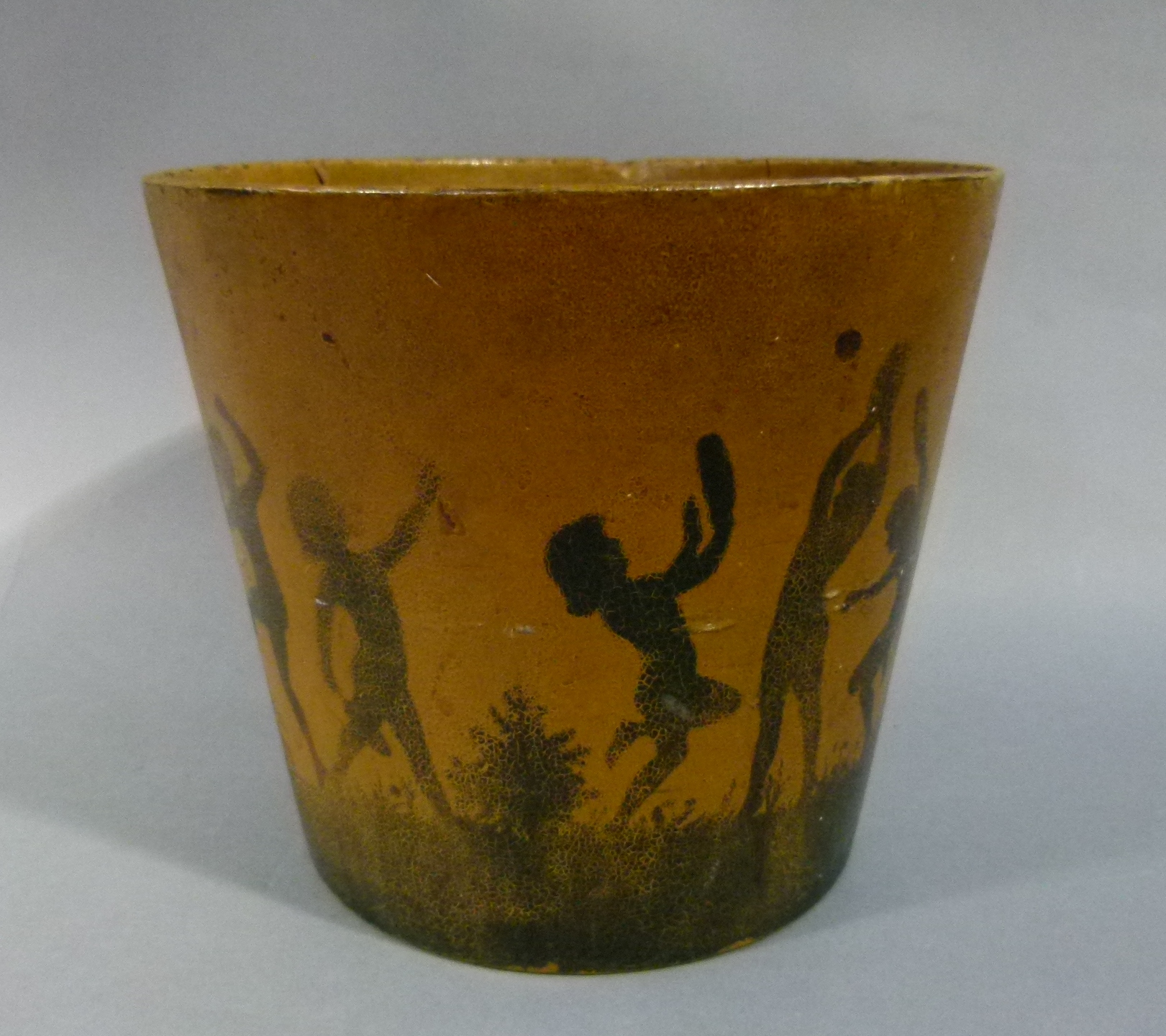 A 1920s papier maché wastepaper bin decorated in black with children playing in silhouette in - Image 2 of 3