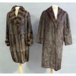 Two fur coats, one with faults