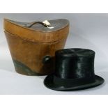 A beaver skin top hat by Hanbridge Norfolk House contained in a leather carrying case